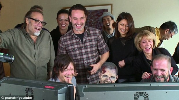 The crew watch the slow motion reaction of the prank.