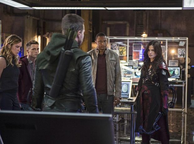 Arrow -- "The Magician" Pictured (L-R): Katie Cassidy as Laurel Lance, Colton Haynes as Roy Harper, Stephen Amell as Oliver Queen, David Ramsey as John Diggle, and Katrina Law as Nyssa al Ghul -- Photo: Ed Araquel/The CW -- ÃÂ© 2014 The CW Network, LLC. All Rights Reserved.
