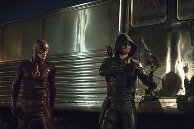 Arrow -- "The Brave and the Bold" Pictured (L-R): Grant Gustin as The Flash and Stephen Amell as The Arrow -- Photo: Cate Cameron/The CW -- ÃÂ© 2014 The CW Network, LLC. All Rights Reserved.