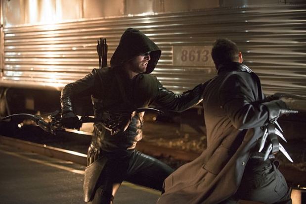 Arrow -- "The Brave and the Bold" Pictured (L-R): Stephen Amell as The Arrow and Nick E. Tarabay as Digger Harkness -- Photo: Cate Cameron/The CW -- ÃÂ© 2014 The CW Network, LLC. All Rights Reserved.
