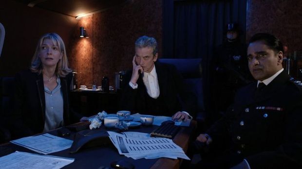 The Doctor - the new President of Earth, with Kate and Colonel Ahmed.