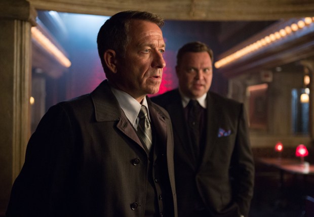 GOTHAM: Alfred (Sean Pertwee, L) pays a visit to Fish Mooney and Butch Gilzean (guest star Drew Powell, R) in the "Lovecraft" episode of GOTHAM airing Monday, Nov. 24 (8:00-9:00 PM ET/PT) on FOX. ©2014 Fox Broadcasting Co. Cr: Jessica Miglio/FOX