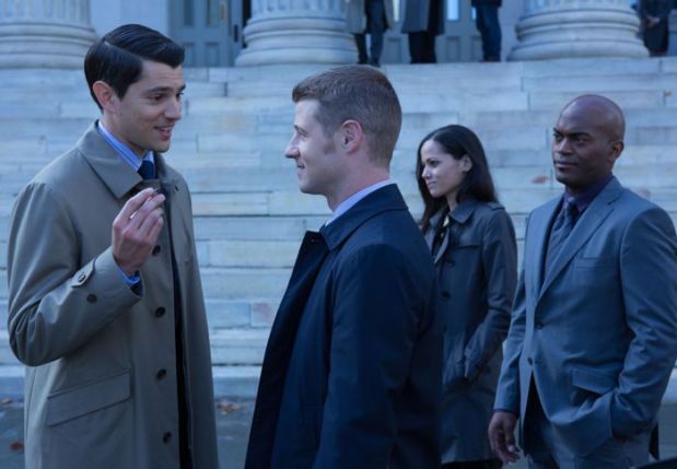 GOTHAM: Detectives James Gordon (Ben McKenzie, second from L), Renee Montoya (Victoria Cartagena, second from R) and Crispus Allen (Andrew Stewart Jones, R) meet Harvey Dent (guest star Nicholas D'Agosto) in the "Harvey Dent" episode of GOTHAM airing Monday, Nov. 17 (8:00-9:00 PM ET/PT) on FOX. ©2014 Fox Broadcasting Co. Cr: Jessica Miglio/FOX