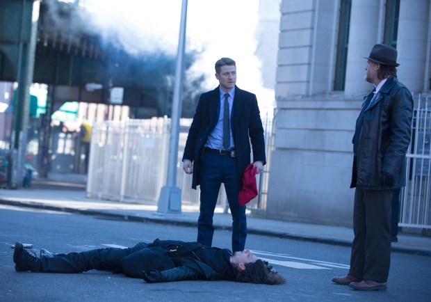GOTHAM: Gordon (Ben McKenzie, C) and Bullock (Donal Logue, R) arrive on the scene of a bank robbery in the "Red Hood" episode of GOTHAM airing Monday, Feb. 23 (8:00-9:00 PM ET/PT) on FOX. ©2015 Fox Broadcasting Co. Cr: Jessica Miglio/FOX