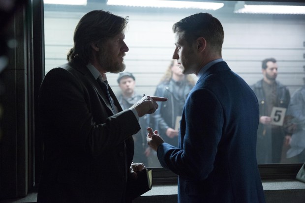 GOTHAM: Gordon (Ben McKenzie, R) and Bullock (Donal Logue, L) participate in a police line-up in the "Red Hood" episode of GOTHAM airing Monday, Feb. 23 (8:00-9:00 PM ET/PT) on FOX. ©2015 Fox Broadcasting Co. Cr: Jessica Miglio/FOX