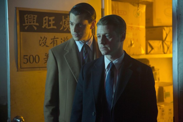 GOTHAM:  Gordon (Ben McKenzie, R) and Dent (guest star Nicholas D'Agosto, L) investigate a lead in the "Everyone Has A Cobblepot" episode of GOTHAM airing Monday, March 2 (8:00-9:00 PM ET/PT) on FOX.  ©2015 Fox Broadcasting Co.  Cr:  Jessica Miglio/FOX