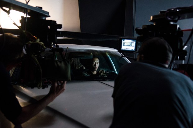 Steven Yeun - The Walking Dead _ Season 5, Episode 11 _ BTS - Photo Credit: Gene Page/AMC