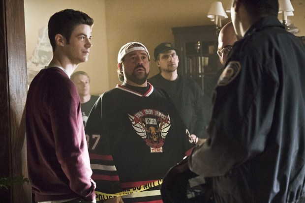 The Flash -- " The Runaway Dinosaur" -- Image: FLA221a_bts_0300b.jpg -- Pictured (L-R): Behind the scenes with Grant Gustin as Barry Allen and Kevin Smith -- Photo: Katie Yu/The CW -- ÃÂ© 2016 The CW Network, LLC. All rights reserved.